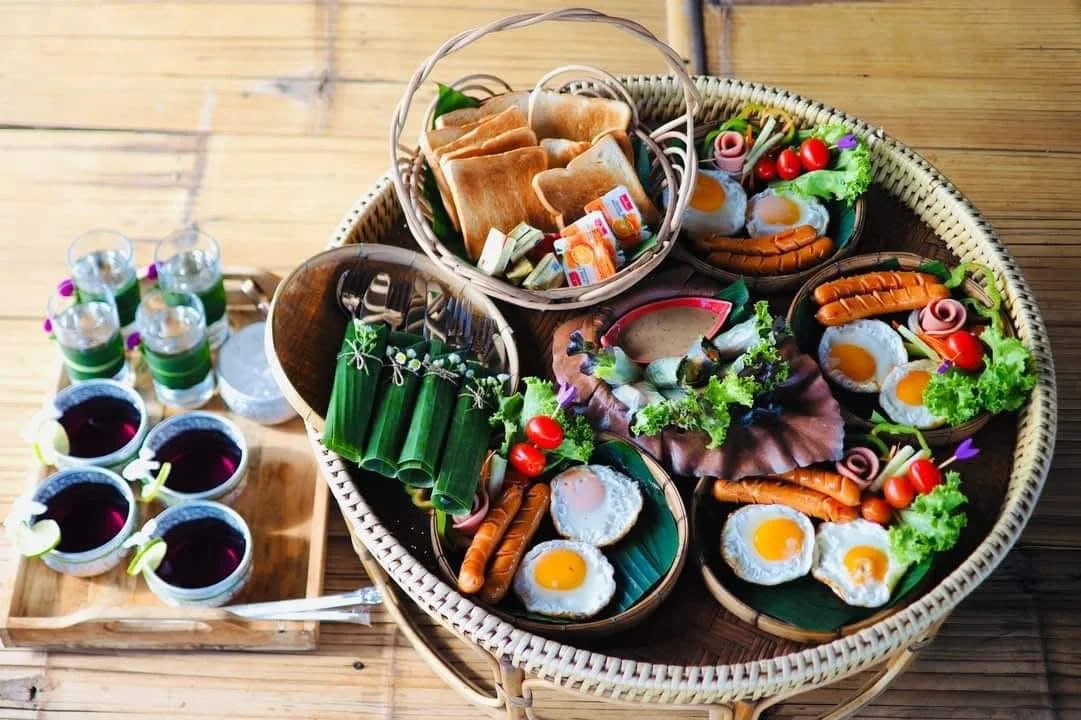 A selection of dishes arranged together on a woven tray